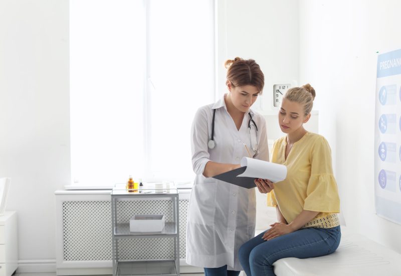 Patient having appointment with doctor in hospital